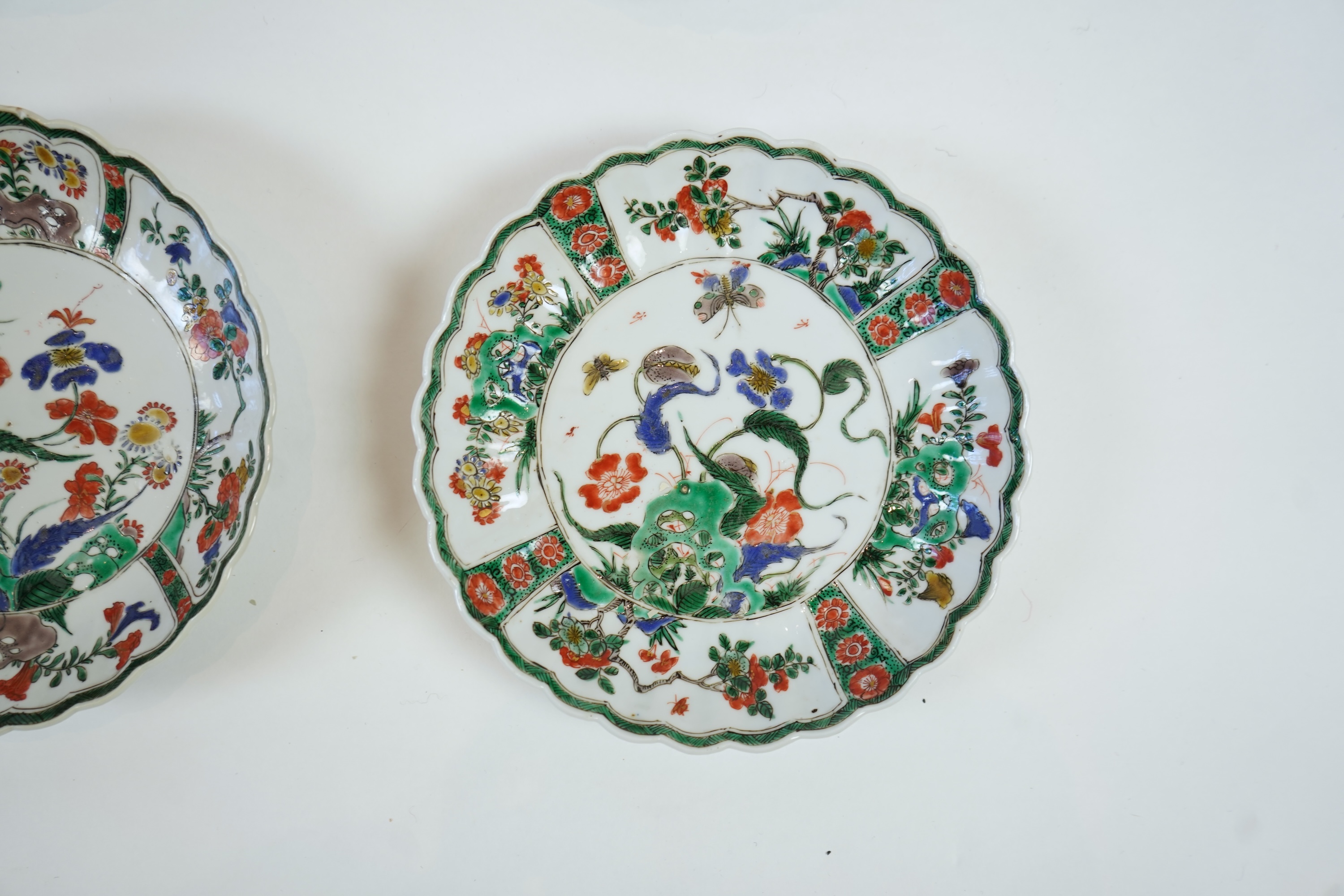 A set of six Chinese famille verte petal lobed saucer dishes, Kangxi period